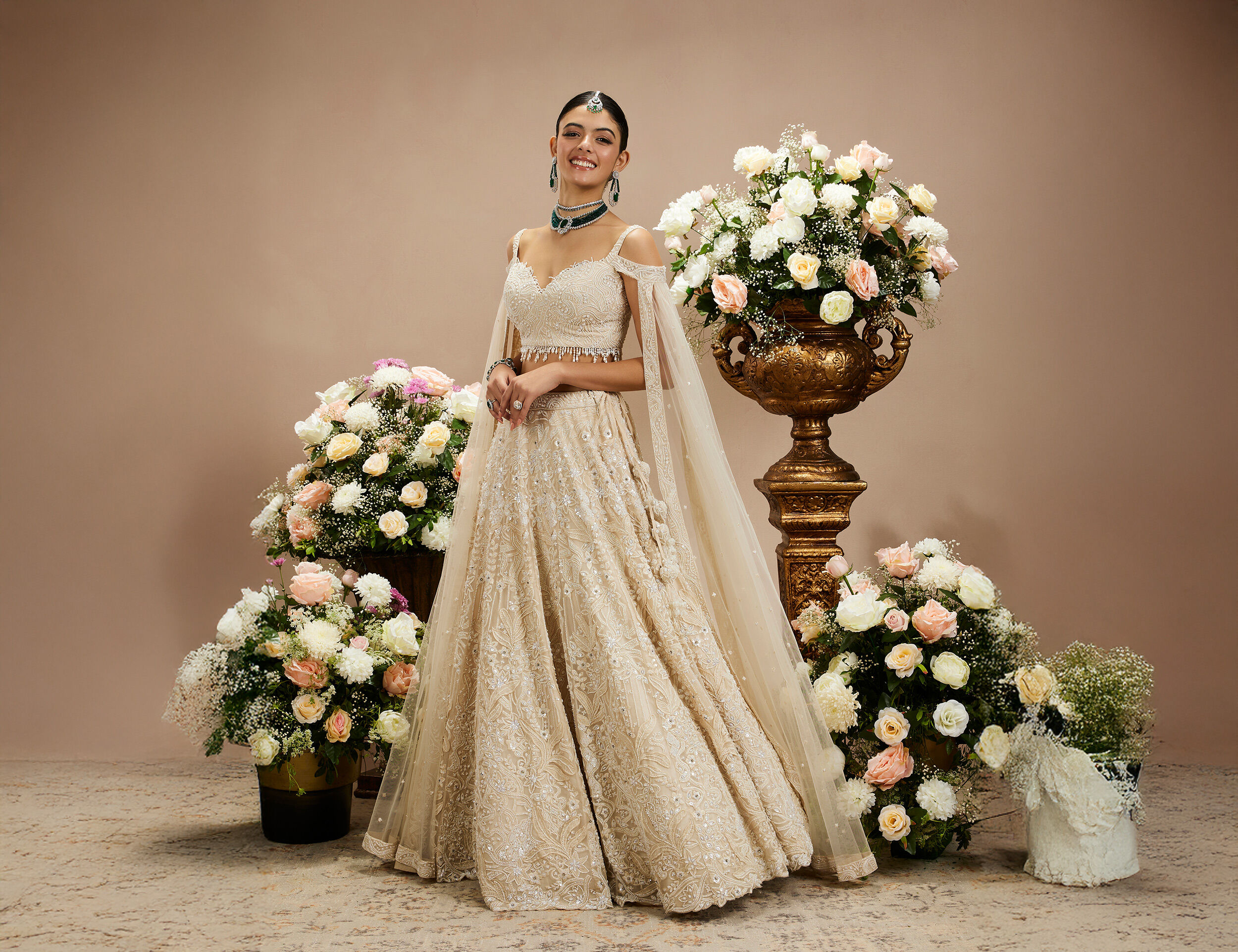 A beautiful woman flaunting her White net lehenga